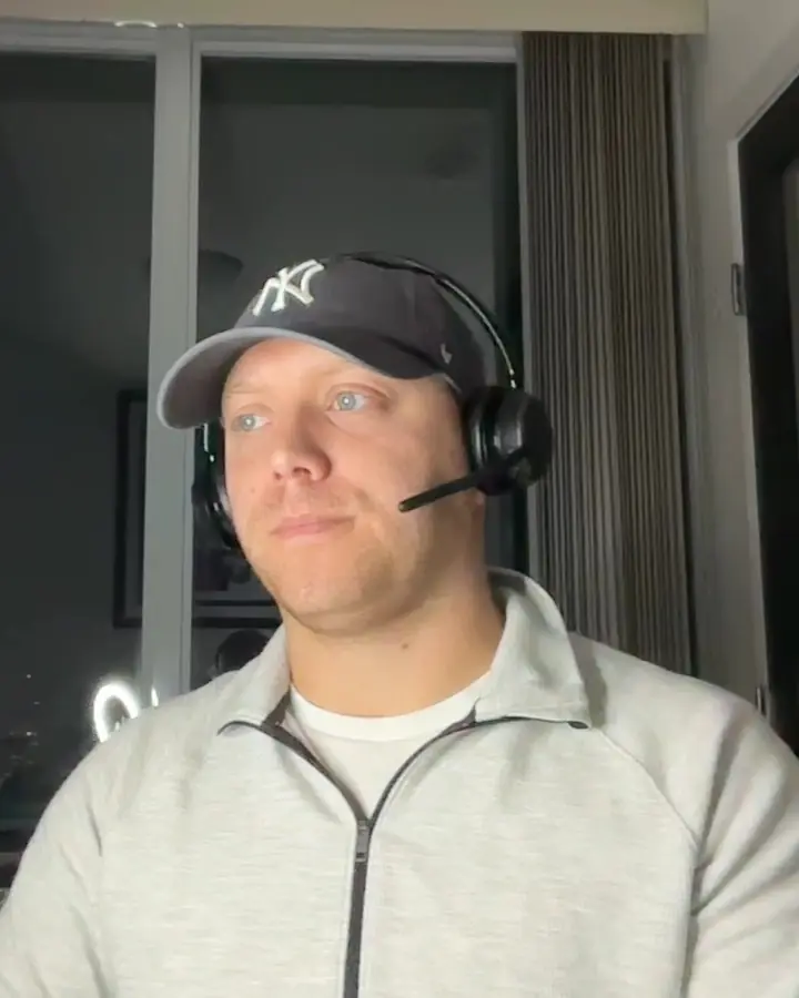 Corey Leon, who runs Coda, on a call with his headset